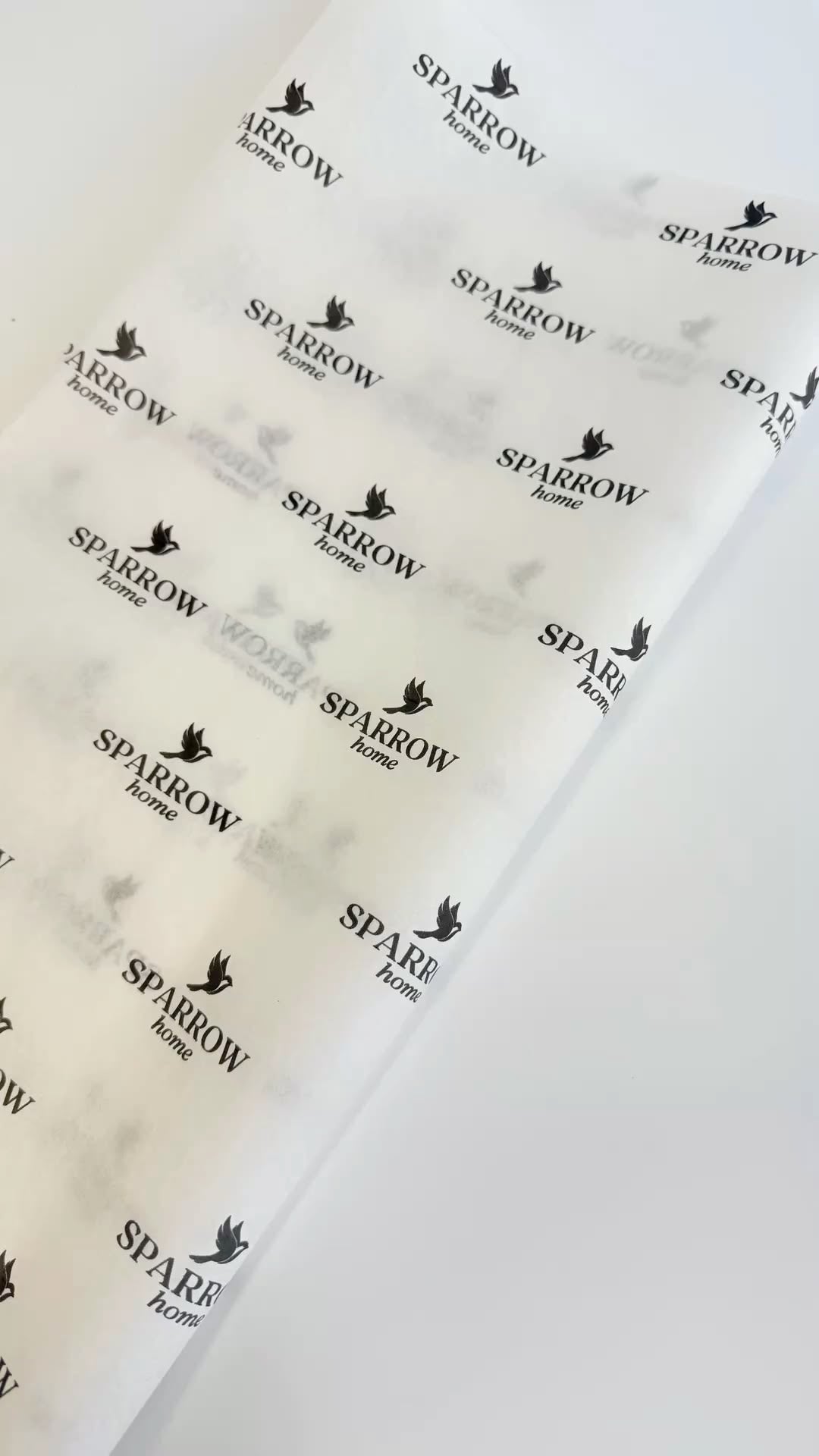 White custom printed tissue paper with Sparrow Home branding