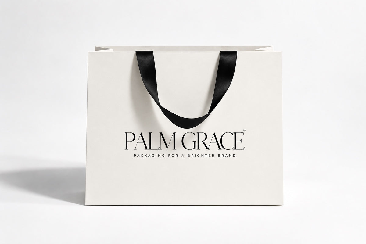 Customized white Palm Grace paper bag with black satin handles
